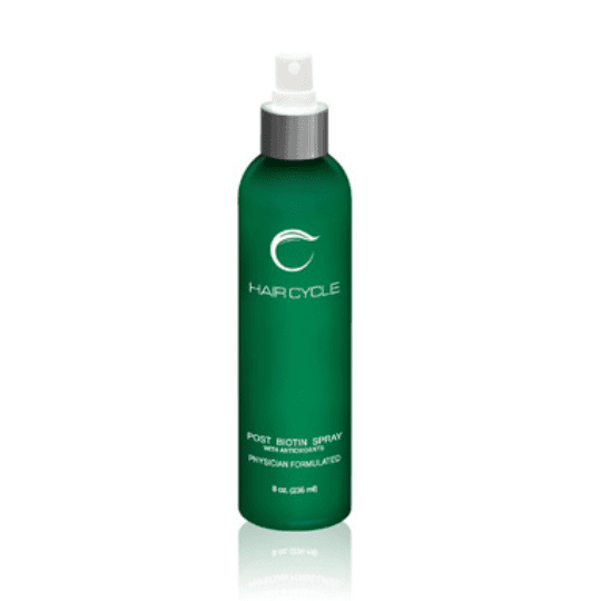 Post Biotin Spray 1 after hair transplant biotin spray in a green bottle