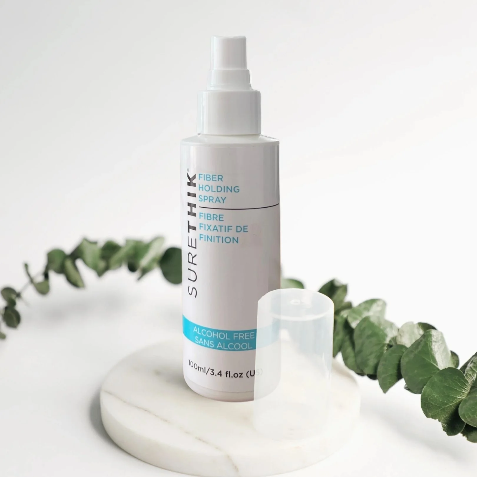 Surethik Fiber Holding Spray 3 surethik fiber holding spray – strong hold for thicker hair appearance